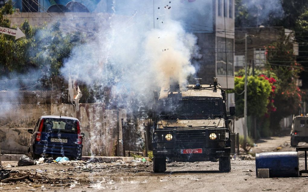 Israeliers vuren traangas af in Jenin. beeld AFP, Ronaldo SCHEMIDT