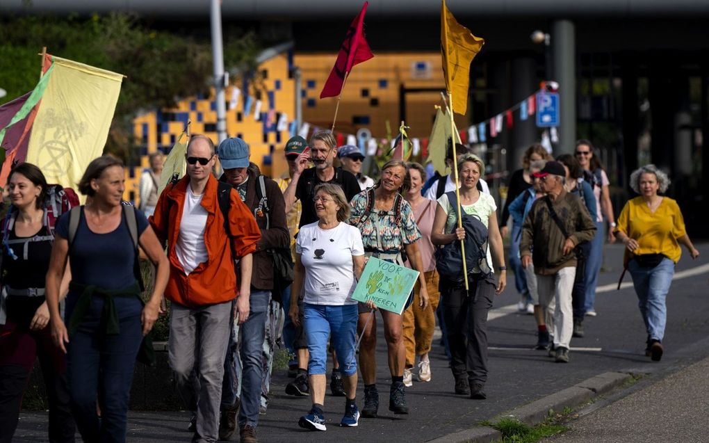 Klimaatactivisten tijdens een A12-mars. beeld ANP, Sander Koning