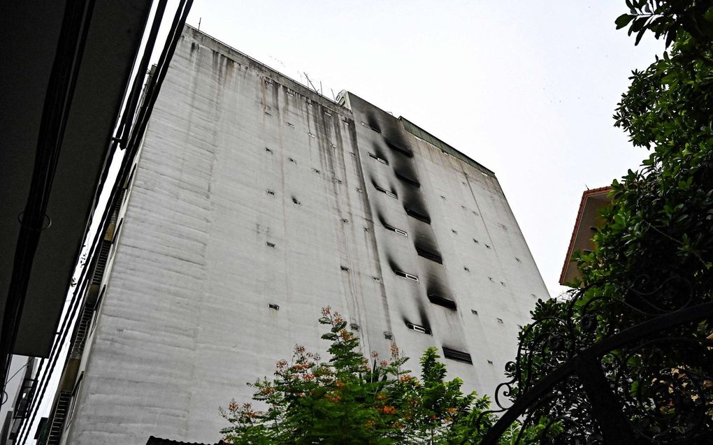 De schade aan het flatgebouw na de brand. beeld AFP, Nhac NGUYEN