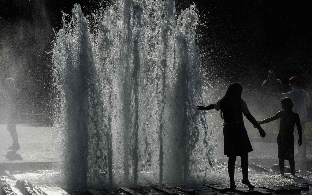 In Berlijn was het op 17 september 27 graden. beeld AFP, John Macdougall