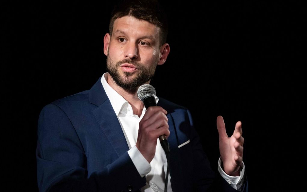 Michal Simecka, de leider van de progressief liberale partij SP, neemt deel aan een debat in Bratislava. beeld AFP, Vladimir Simicek