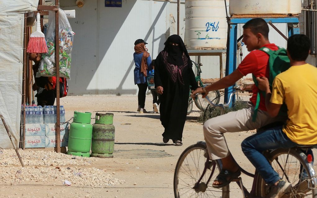 Gevluchte islamitische extremisten ervaren meer dan eens liefde van christenen die hen opzoeken en hulp bieden. Foto: vluchtelingenkamp voor Syriërs in Jordanië. beeld AFP, Khalil Mazraawi