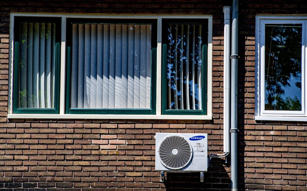 Een vochtige bakstenen muur verliest veel warmte. beeld ANP, Robin Utrecht