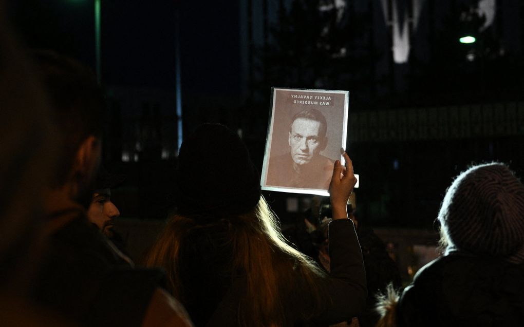 Demonstratie vrijdagavond bij de Russische ambassade in Washington. beeld AFP, Brendan SMIALOWSKI