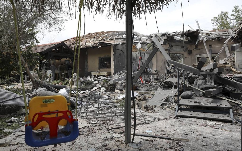 Door raket getroffen huis in Moshav Mishmeret. beeld EPA, Abir Sultan