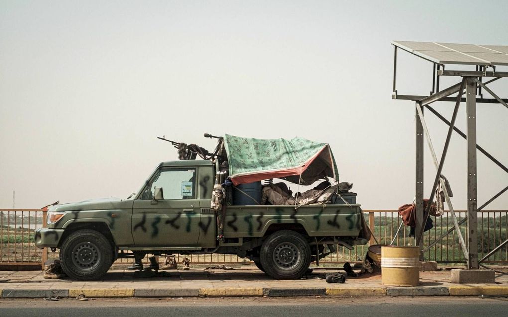 Leden van de Rapid Support Forces, dinsdag in Khartoem.  beeld AFP, Yasuyoshi Chiba