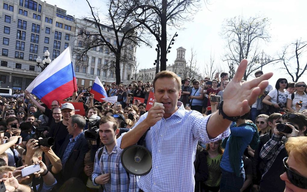 Oppositieleider Alexej Navalni (m.) is vorige week opnieuw opgepakt omdat hij antiregeringsdemonstraties organiseert in Moskou. beeld AFP, Kirill Kudryavtsev