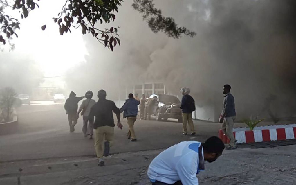 „Vluchtelingen in ons huis waren verdoofd door het geweervuur, het gejoel en de grote rookwolken.” Foto: protesten in Wamena. beeld AFP, Vina Rumbewas