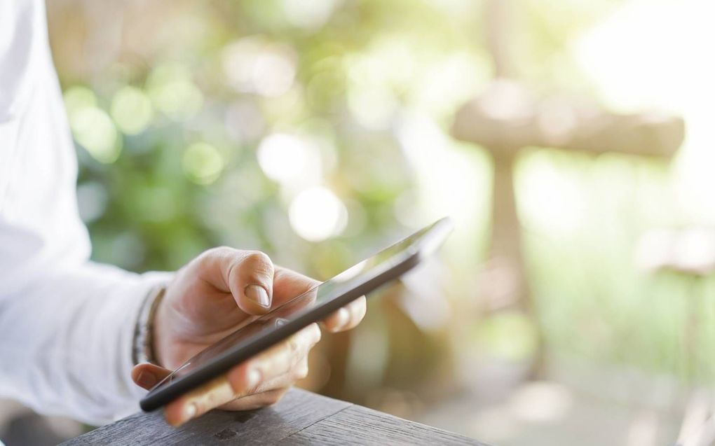 „Christenen moeten hogere prioriteiten hebben dan de nieuwste online video.” beeld Getty Images/iStockphoto