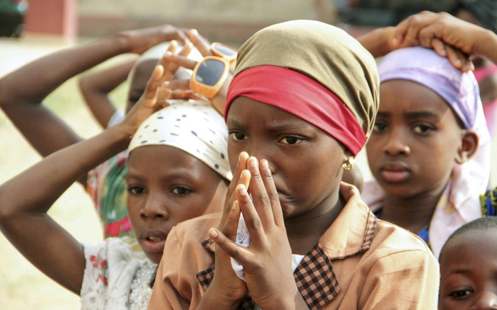 Een christelijk Nigeriaans meisje bij een protestmars tegen geweld van herders. beeld AFP, Emmy Ibu