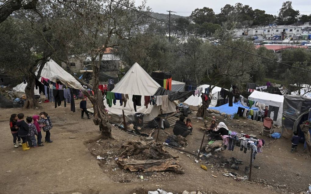 „Het minste wat we kunnen doen, is 500 minderjarige kinderen naar Nederland halen.” Foto: kinderen in kamp Moria op Lesbos. beeld AFP, Louisa Gouliamaki