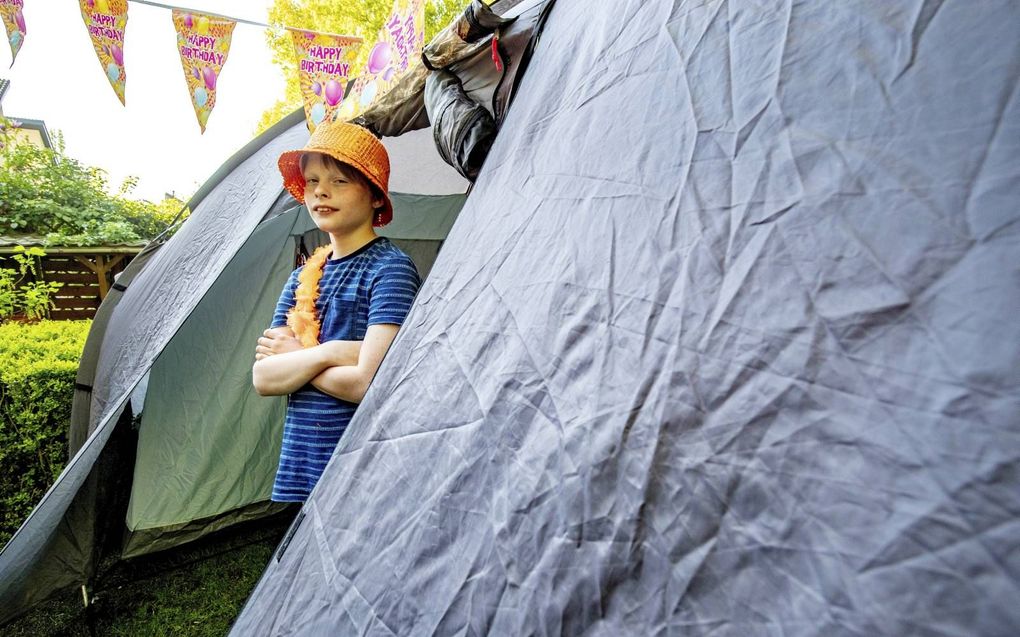 Zomervakantie in eigen tuin. beeld ANP, Niels Wenstedt