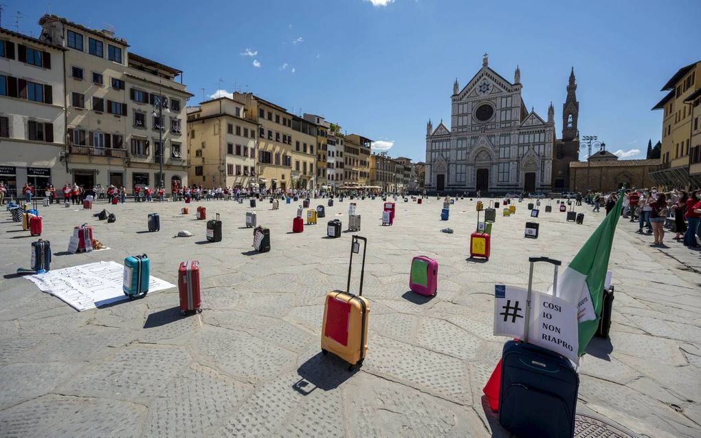 Reisbureaus demonstreerden eerder deze week in Florence, Italië, om aandacht te vragen voor de crisis in de reissector. beeld EPA, Claudio Giovannini