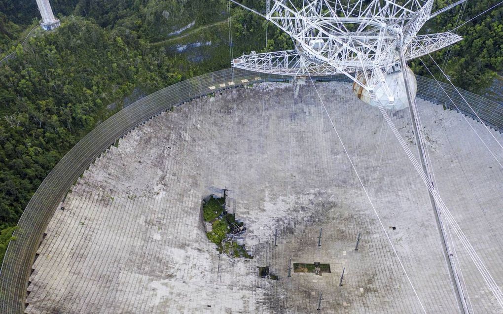 Tientallen jaren leverde de Arecibo-radiotelescoop op Puerto Rico een bijdrage aan astronomisch onderzoek aan sterren, planeten en het zonnestelsel.  beeld ANP, Hollandse Hoogte, AFP