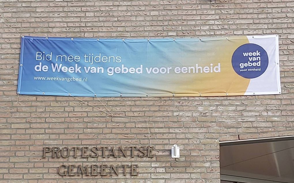 Spandoek van de week van gebed vorig jaar in de protestantse gemeente van Nuenen.  beeld Raad van Kerken