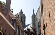De hervormde emeritus predikant ds. M. Geuze schreef brieven aan alle kerkelijke gemeenten op Tholen en Sint Philipsland. Foto: de Grote Kerk van Tholen. beeld RD, Anton Dommerholt