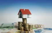 Beleggen door het verhogen van de hypotheek kent risico’s. beeld ANP, Lex van Lieshout