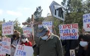 Protest in Cyprus tegen de keuze om met het liedje ”El Diablo” mee te doen aan het Eurovisie Songfestival, maart. beeld EPA, Katia Christodoulou