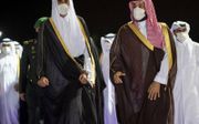 Sheikh Tamim van Qatar (l.) in Saudi-Arabië. beeld AFP, Bandar Al-Jaloud