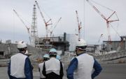 Bij de kernramp in Fukushima Daiichi overleed niemand aan de gevolgen van radioactieve straling.  beeld EPA, Kimimasa Mayama