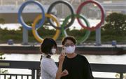 De Japanse bevolking is bepaald niet enthousiast voor de Olympische Spelen die vrijdag in Tokio officieel van start zijn gegaan. beeld EPA, Kimimasa Mayama