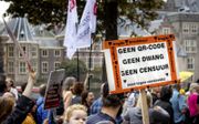 „Een fors deel van de bevolking voelt zich door de overheid niet gezien, miskend en verwaarloosd.” Foto: protest in Den Haag tegen het coronatoegangsbewijs. beeld ANP, Koen van Weel