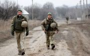 Oekraïense patrouilles langs de frontlinie. „Door het geweld dat Poetin de afgelopen jaren in oost-Oekraïne heeft ontketend, hebben inmiddels rond de 14.000 mensen het leven verloren, onder wie vele burgers.” beeld AFP, Anatolii