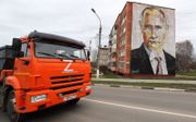 Muurschildering van Poetin in de Russische stad Kashira. beeld EPA, Maxim Shipenkov