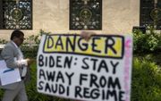 Protest in VS tegen reis Biden. beeld AFP