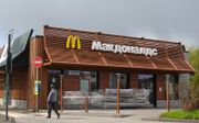 „Het is aannemelijk dat sancties bijdragen aan de economische pijn. Gewone Russen merken dit aan hoge prijzen in de supermarkt of de sluiting van de McDonald’s om de hoek.” beeld EPA, Maxim Shipenkov