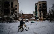Verwoeste gebouwen in Borodyanka, bij Kiev. beeld AFP, Dimitar DILKOFF