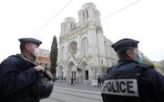Bewaking bij de Notre Dame in Nice, waar in oktober 2020 een aanslag plaatsvond. beeld EPA, Eric Gaillard