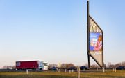 Een billboard langs de A1 bij Apeldoorn. beeld RD, Anton Dommerholt