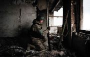 Een Oekraïense militair in Bachmoet. beeld AFP, YASUYOSHI CHIBA