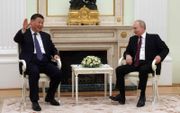 De Russische president Vladimir Poetin en zijn Chinese ambtgenoot Xi Jinping in Moskou. beeld AFP, Sergei Karpukhin