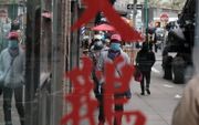 Straatbeeld in Chinatown New York. beeld AFP, Spencer Platt
