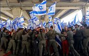 Protest bij de Israëlische nationale luchthaven Ben Goerion. beeld AFP, Gil Cohen-Magen