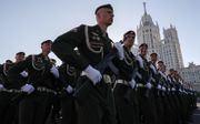 Russische militairen bij een parade in Moskou. beeld Yuri Kochetkov