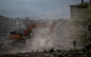 De sloop- en puinruimingswerkzaamheden in het centrum van Antakya zijn nog in volle gang. beeld AFP, Ozan Kose