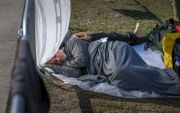 In Ter Apel sliepen migranten vorig jaar augustus ​in de buitenlucht. beeld ANP, Jilmer Postma