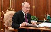 De Russische president Vladimir Poetin, woensdag in Moskou. beeld EPA, Mikhael Klimentyev