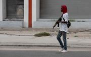 Gewapende bendes terroriseren de straten van de Haïtiaanse hoofdstad Port-au-Prince. beeld AFP