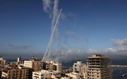 De terreurbeweging Hamas schiet vanuit Gaza dodelijke raketten af op Israël. beeld AFP, Mohammed Abed