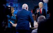 Frans Timmermans (m.) zocht donderdagavond in het SBS6-debat veelvuldig de confrontatie met Geert Wilders (r.). beeld ANP, Koen van Weel