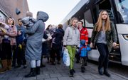 De eerste groep Oekraïense vluchtelingen komt in maart 2022 aan in Waddinxveen. beeld ANP, Marco de Swart