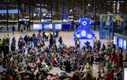 Demonstranten houden op station Rotterdam Centraal een sit-in om solidariteit te tonen met Gaza. beeld ANP, Robin Utrecht