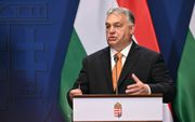 „Vaak wordt gewezen op de schade die populistische regeringen aan de instituties aanrichten. Denk aan Polen en Hongarije. Foto: de Hongaarse premier Viktor Orbán. beeld AFP, Attila Kisbenedek