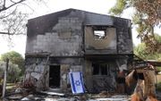 Verwoestingen in de Israëlische kibboets Be’eri, aan de grens met de Gazastrook. Hier hielden Hamasterroristen op 7 oktober op een gruwelijke manier huis. beeld EPA, Abir Sultan