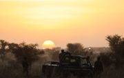 „Je kunt gerust stellen dat de Sahel inmiddels het epicentrum van internationaal jihadisme is. Extremisten maken gebruik van problemen die al in de regio spelen.” Foto: Nigerese soldaten houden wacht bij een legerbasis. beeld AFP, Ludovic Marin