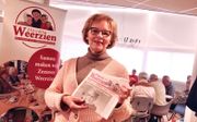 Hanneke de Vroe op de redactievergadering van Zeeuws Weerzien. „Onze krant is het bewijs dat ouderen er nog toe doen.” beeld Van Scheyen Fotografie